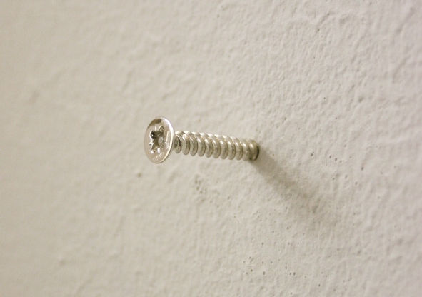 When its our turn I 2007 one silver screw with white topaz, one palladium screw with white diamond, edition of 3 (in pairs) 2.5cm long